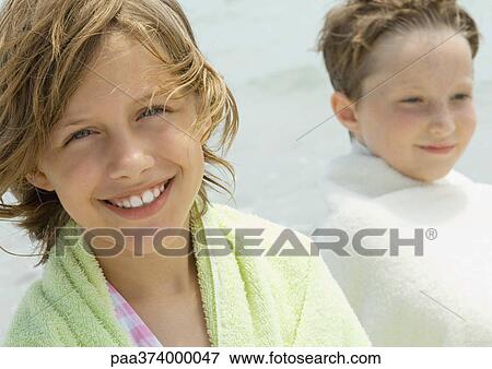 Stock Photo - Children wrapped in towels. Fotosearch