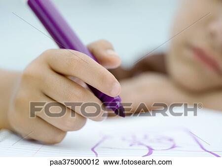 Stock Image - Child drawing with marker. Fotosearch