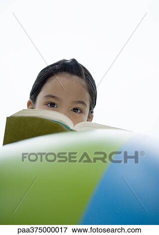 Girl with book View Large Photo Image Stock Photo - Girl with book. Fotosearch