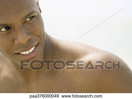 Barechested man, smiling View Large Photo Image Stock Photo - Barechested man, smiling. Fotosearch