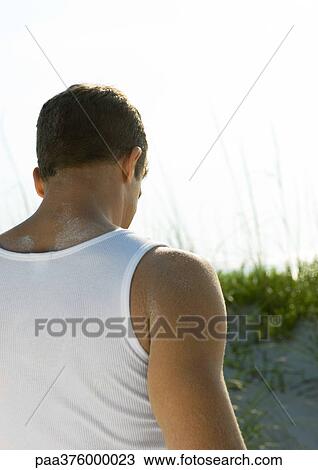 Man on beach, rear view View Large Photo Image Stock Image - Man on beach, rear view. Fotosearch