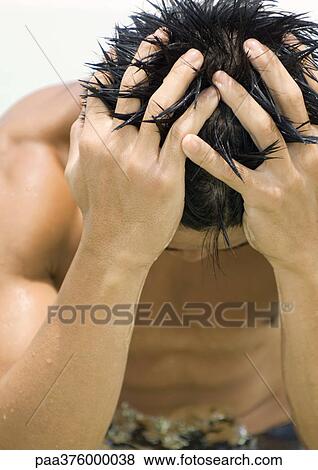 Man running fingers through wet hair View Large Photo Image Stock Photo - Man running fingers through wet hair. Fotosearch