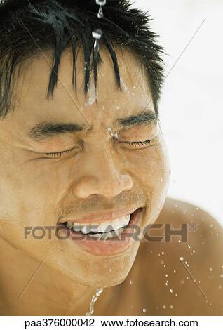 Man splashing face View Large Photo Image Stock Image - Man splashing face. Fotosearch