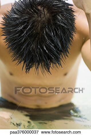 Man, waist deep in water with head down View Large Photo Image Stock Photo - Man, waist deep in water with head down. Fotosearch
