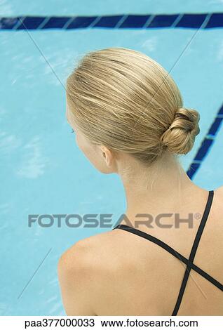Woman facing pool, rear view View Large Photo Image Stock Image - Woman facing pool, rear view. Fotosearch