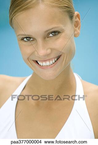 Woman in bathing suit smiling, potrait View Large Photo Image Picture - Woman in bathing suit smiling, potrait. Fotosearch