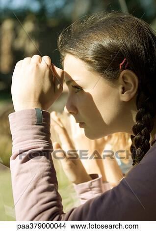 Girl looking through glass, close-up View Large Photo Image Picture - Girl looking through glass, close-up. Fotosearch