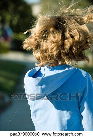 Girl with hair being tousled, rear view View Large Photo Image Stock Image - Girl with hair being tousled, rear view. Fotosearch