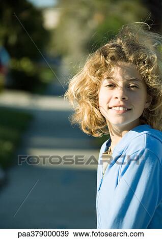 Preteen girl smiling View Large Photo Image Stock Photo - Preteen girl smiling. Fotosearch