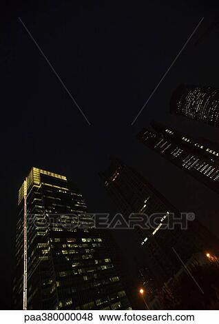 Skycrapers at night View Large Photo Image Stock Photo - Skycrapers at night. Fotosearch