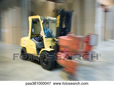 Forklift in paper mill View Large Photo Image Stock Photo - Forklift in paper mill. Fotosearch