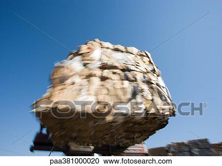 Forklift transporting bales of paper View Large Photo Image Stock Image - Forklift transporting bales of paper. Fotosearch