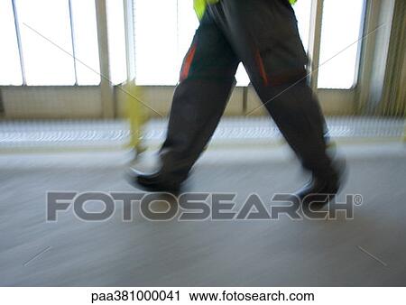 Man walking, low section View Large Photo Image Stock Image - Man walking, low section. Fotosearch