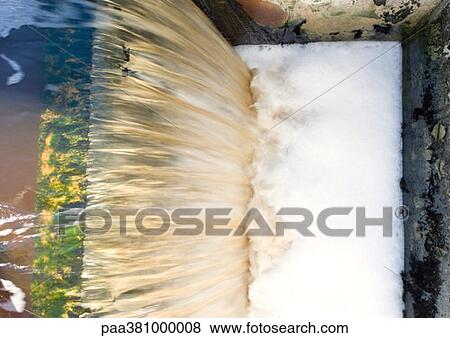 Stock Photo - Paper mill, waste water, high angle view. Fotosearch