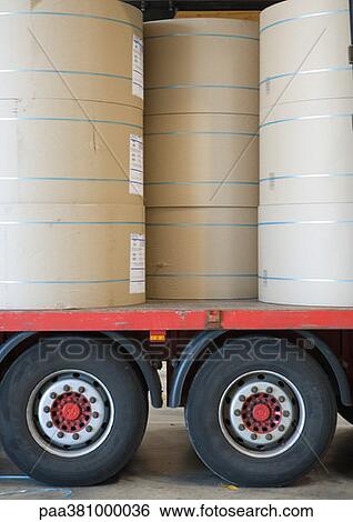 Stock Photograph - Rolls of paper stacked on truckbed. Fotosearch