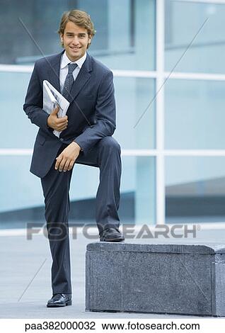 Businessman, full length portrait View Large Photo Image Stock Image - Businessman, full length portrait. Fotosearch