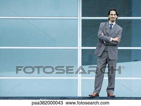 Businessman, full length portrait View Large Photo Image Stock Image - Businessman, full length portrait. Fotosearch
