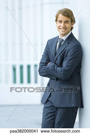 Businessman, portrait, smiling at camera View Large Photo Image Stock Image - Businessman, portrait, smiling at camera. Fotosearch