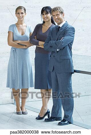 Three business executives, full length portrait View Large Photo Image Stock Photo - Three business executives, full length portrait. Fotosearch