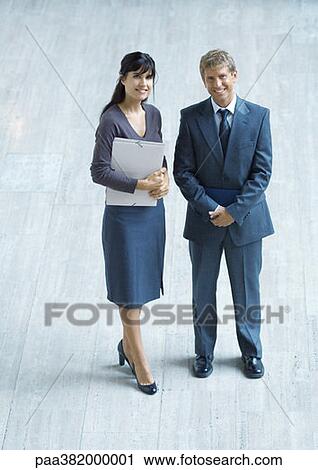 Stock Image - Two business executives, full length. Fotosearch