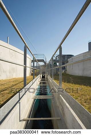 Stock Image - Water treatment area in paper plant. Fotosearch