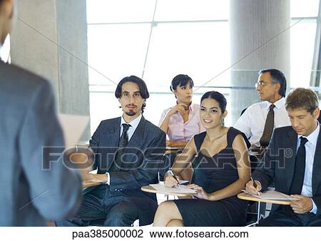Executives sitting in seminar View Large Photo Image Stock Image - Executives sitting in seminar. Fotosearch