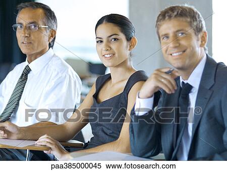 Executives sitting in seminar View Large Photo Image Stock Photography - Executives sitting in seminar. Fotosearch
