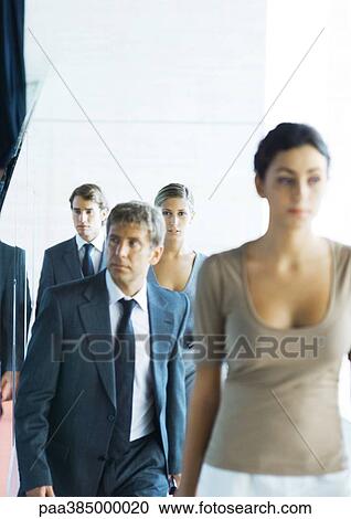 Executives walking in corridor View Large Photo Image Stock Image - Executives walking in corridor. Fotosearch