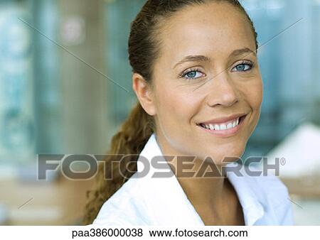 Businesswoman smiling at camera View Large Photo Image Stock Photo - Businesswoman smiling at camera. Fotosearch