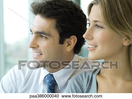 Male and female business associates, profile, portrait View Large Photo Image Stock Image - Male and female business associates, profile, portrait. Fotosearch