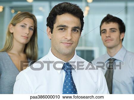 Three business associates, portrait View Large Photo Image Stock Image - Three business associates, portrait. Fotosearch