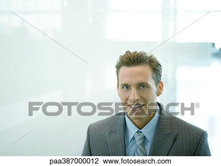 Stock Image - Businessman, smiling. Fotosearch