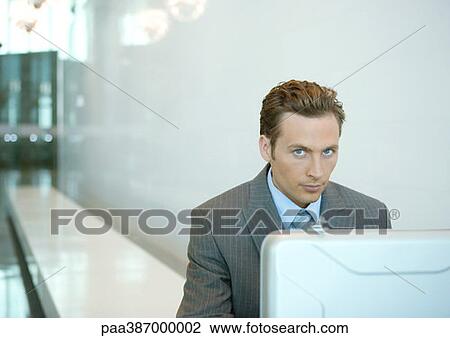 Man sitting with open briefcase View Large Photo Image Stock Image - Man sitting with open briefcase. Fotosearch