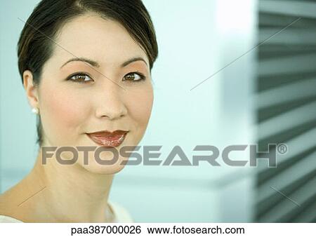 Woman smiling View Large Photo Image Stock Photograph - Woman smiling. Fotosearch