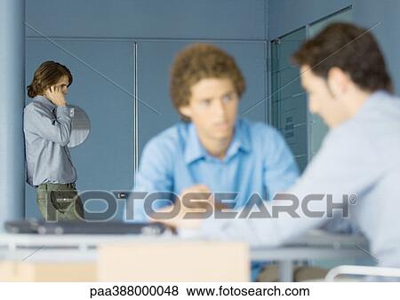 Young businessmen working in office View Large Photo Image Stock Photo - Young businessmen working in office. Fotosearch