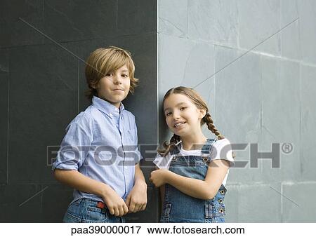 Stock Photo - Boy and girl, portrait. Fotosearch