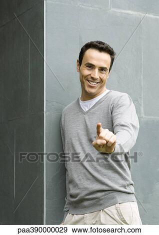 Man, pointing at camera, portrait View Large Photo Image Stock Photo - Man, pointing at camera, portrait. Fotosearch