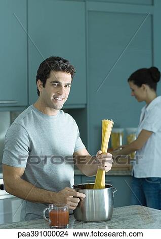 Man making pasta View Large Photo Image Picture - Man making pasta. Fotosearch