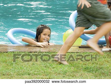 Children at swimming pool View Large Photo Image Stock Image - Children at swimming pool. Fotosearch