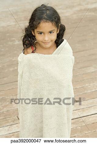 Girl wrapped in towel View Large Photo Image Stock Photo - Girl wrapped in towel. Fotosearch