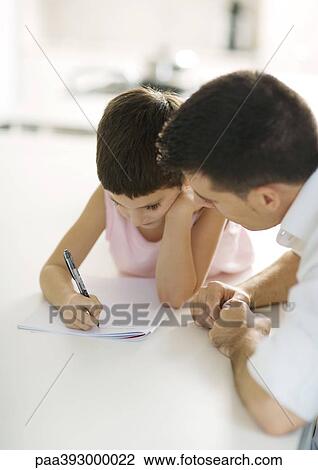 Father helping child with homework View Large Photo Image Stock Image - Father helping child with homework. Fotosearch