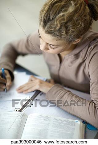 Preteen girl doing homework View Large Photo Image Stock Photograph - Preteen girl doing homework. Fotosearch