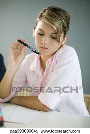 Teenage girl doing homework View Large Photo Image Stock Photography - Teenage girl doing homework. Fotosearch