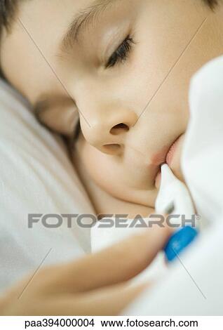 Child having temperature taken View Large Photo Image Picture - Child having temperature taken. Fotosearch