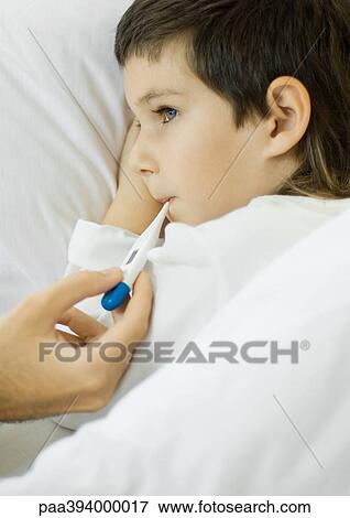 Child having temperature taken View Large Photo Image Stock Photo - Child having temperature taken. Fotosearch