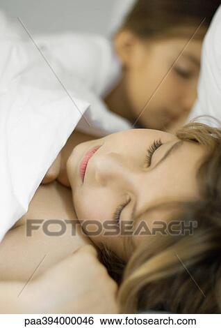 Children sleeping in bed View Large Photo Image Stock Photograph - Children sleeping in bed. Fotosearch