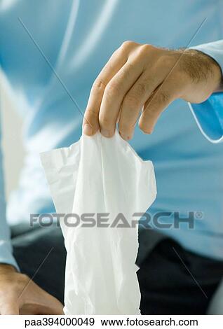 Man taking face tissue View Large Photo Image Stock Photo - Man taking face tissue. Fotosearch