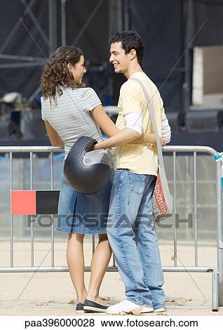 Stock Photo - Teen couple embracing. Fotosearch