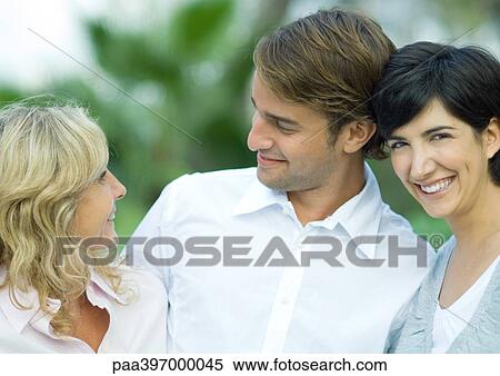 Adult couple with mature woman, smiling View Large Photo Image Stock Photography - Adult couple with mature woman, smiling. Fotosearch