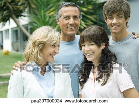 Mature couple with teenage grandchildren View Large Photo Image Picture - Mature couple with teenage grandchildren. Fotosearch